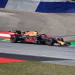 A Red Bull Racing Honda racing car on a track.