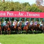 Longchamps starting stalls bursting open.